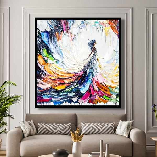Colorful abstract painting on a wall above a sofa in a living room.