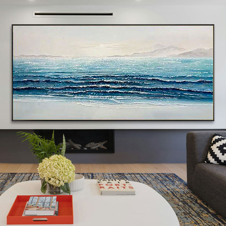 large ocean painting in living room