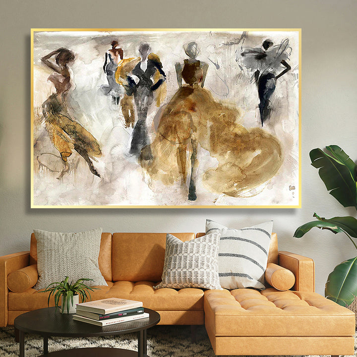 Abstract art painting of figures on a wall above a brown sofa with decorative pillows.