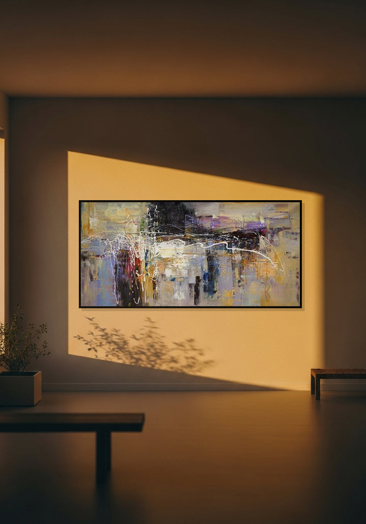 Abstract painting on a wall in a dimly lit room
