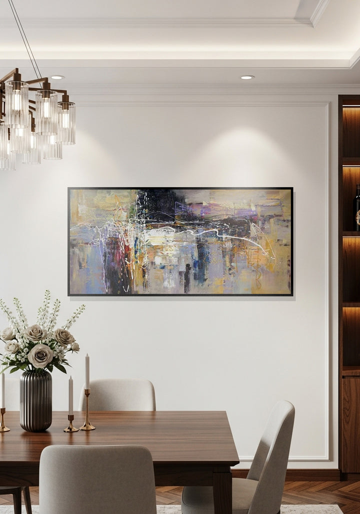 Dining room with abstract painting on the wall, table, chairs, and decorative elements.
