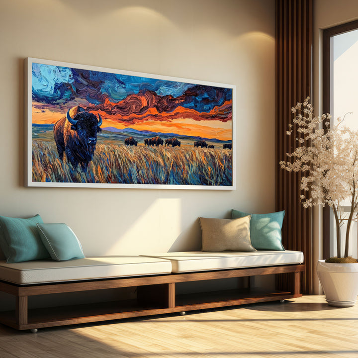 Living room with a large abstract painting of a bison and sunset over a field.
