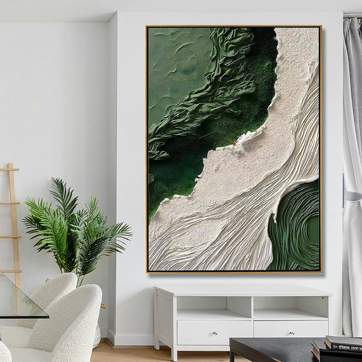 Abstract art piece in a modern living room setting with a plant and furniture.