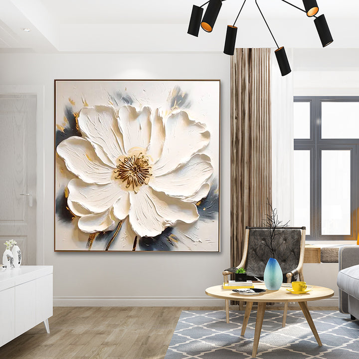 Living room with a large floral painting on the wall
