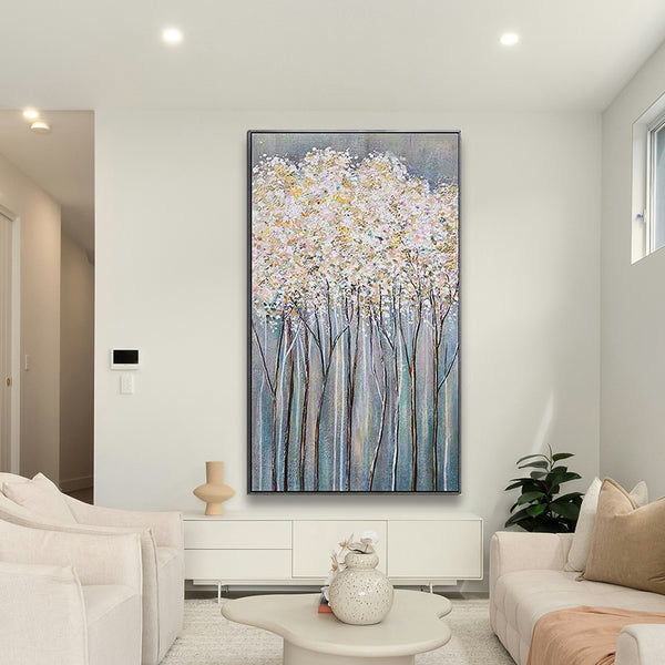 Living room with a large abstract painting of trees and flowers on the wall.