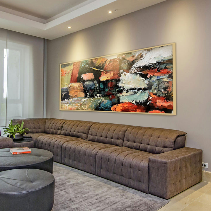 Modern living room with a large brown sectional sofa and abstract painting on the wall.