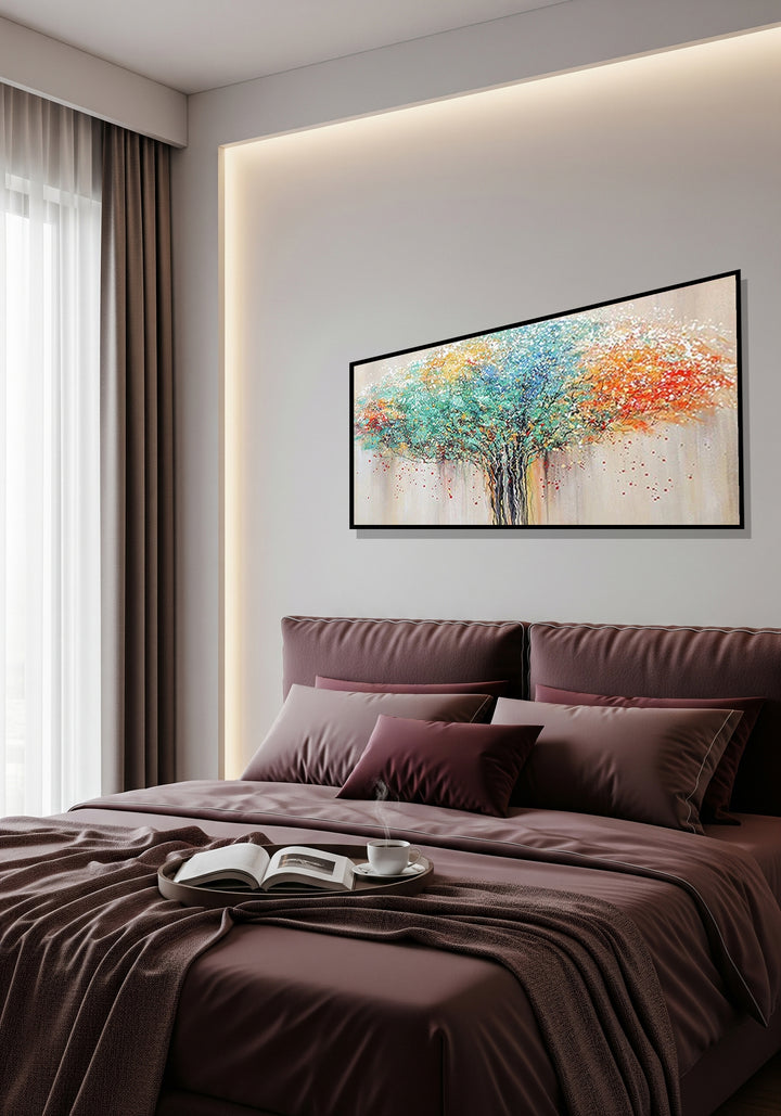 Modern bedroom with a bed, pillows, and a colorful abstract painting on the wall.